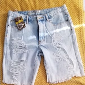 Stonewashed distressed Bermuda shorts